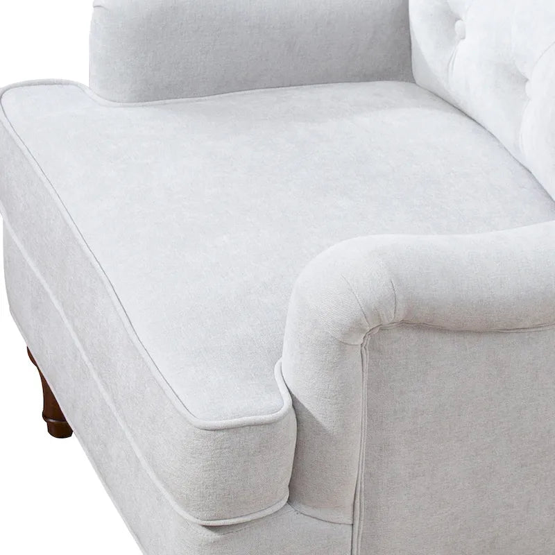 Fauteuil d'appoint à dossier haut en chenille couleur avoine, avec accoudoirs, dossier capitonné et pieds tournés en bois, style rétro