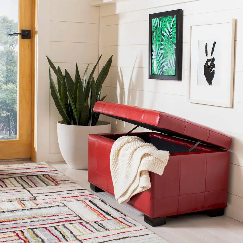 Banc de rangement en similicuir rouge, capitonné, avec couvercle relevable et pieds en bois noir