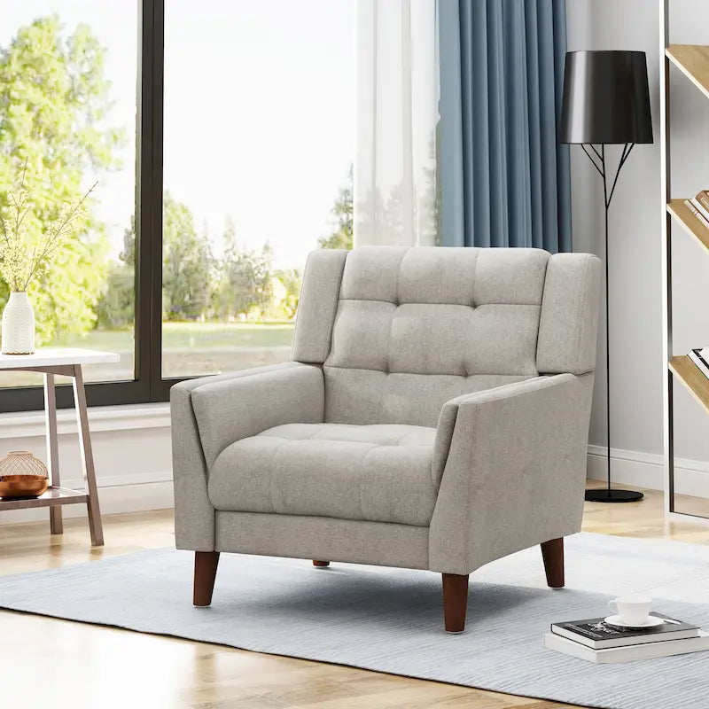 Fauteuil de club gris foncé en polyester, dossier, accoudoirs et assise capitonnés gaufrés, pieds effilés en bois de bouleau noyer, moderne du milieu du siècle