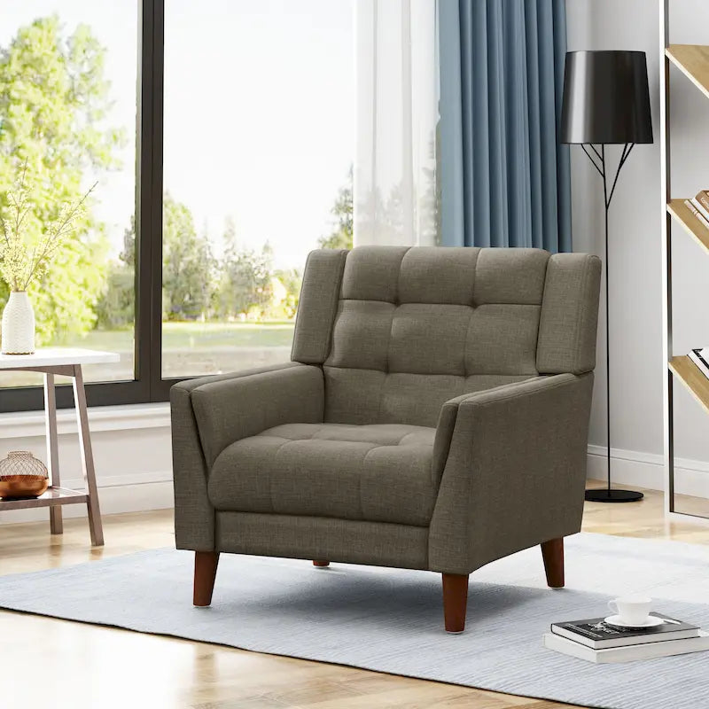 Fauteuil de club gris foncé en polyester, dossier, accoudoirs et assise capitonnés gaufrés, pieds effilés en bois de bouleau noyer, moderne du milieu du siècle