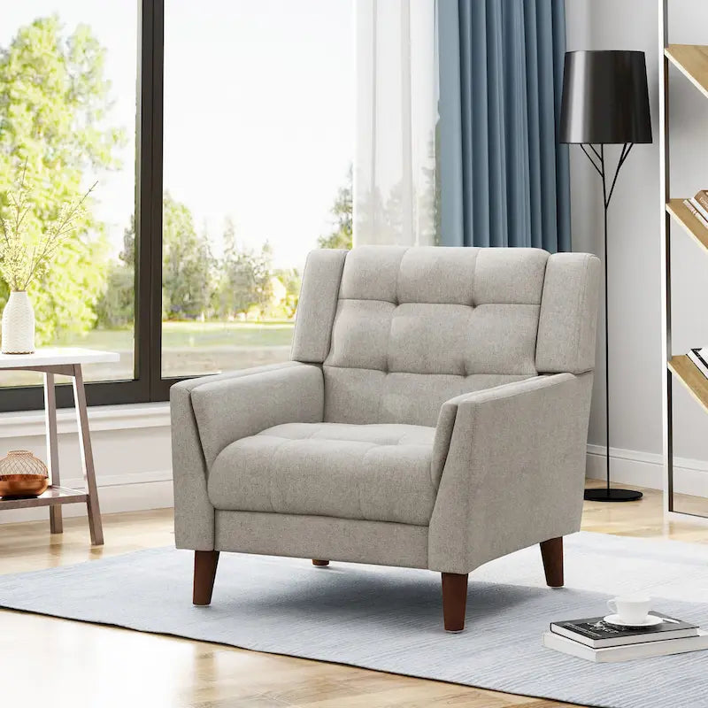 Fauteuil de club gris foncé en polyester, dossier, accoudoirs et assise capitonnés gaufrés, pieds effilés en bois de bouleau noyer, moderne du milieu du siècle