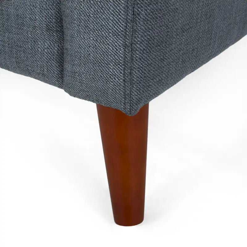 Fauteuil de club gris foncé en polyester, dossier, accoudoirs et assise capitonnés gaufrés, pieds effilés en bois de bouleau noyer, moderne du milieu du siècle