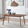 Table à manger extensible en noyer, avec rallonge papillon, pieds coniques style Mid-Century, coins arrondis.