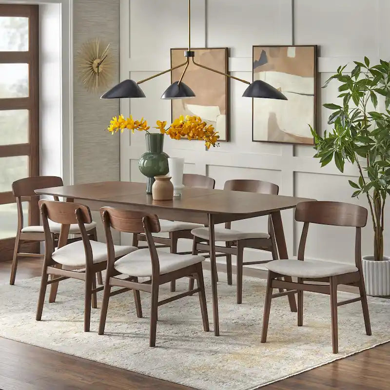 Table à manger extensible en noyer, avec rallonge papillon, pieds coniques style Mid-Century, coins arrondis.