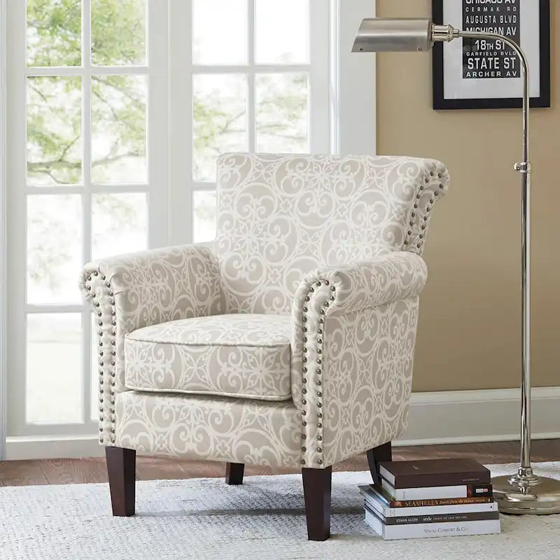 Fauteuil Club en tissu imprimé ajouré gris, garniture cloutée argentée, coussin d'assise amovible, pieds en bois massif