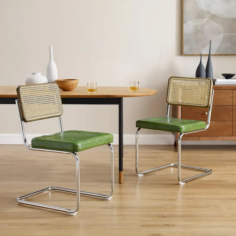 Chaise de salle à manger cantilever blanc cassé, dossier en cannage, structure chromée, assise en similicuir