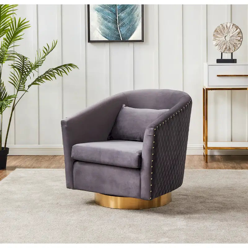 Fauteuil baignoire pivotant en velours vieux rose, capitonnage à losanges, garniture cloutée, piètement pivotant doré