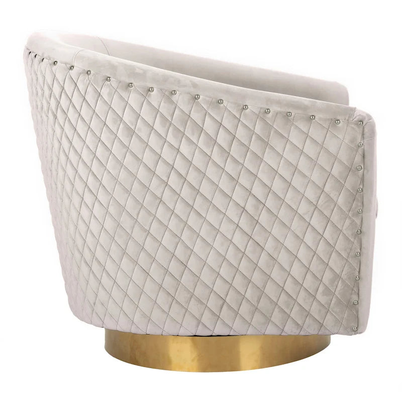 Fauteuil baignoire pivotant en velours vieux rose, capitonnage à losanges, garniture cloutée, piètement pivotant doré