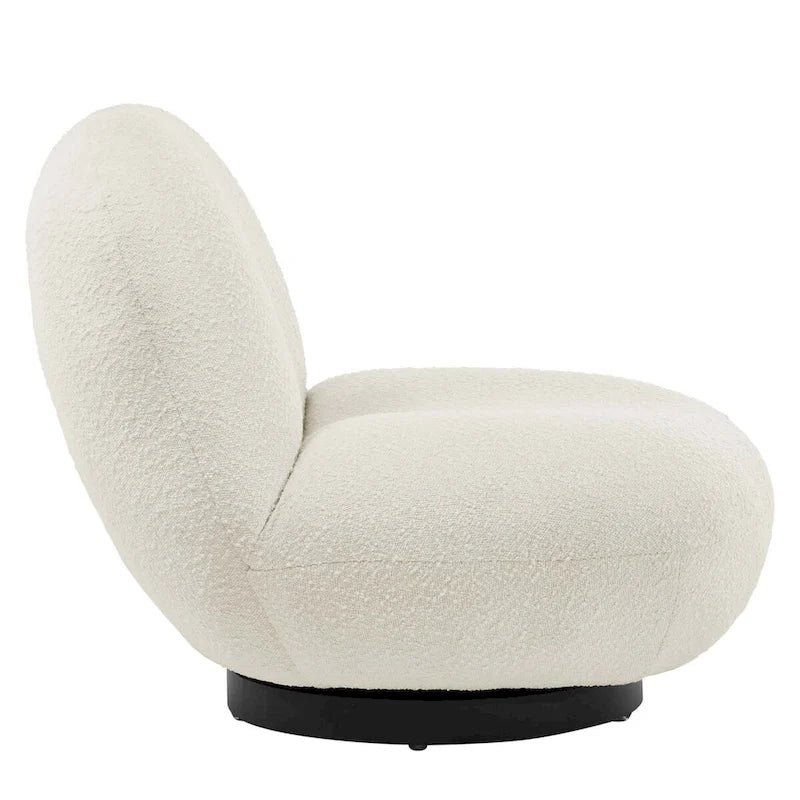 Fauteuil d'appoint pivotant en bouclette ivoire, silhouette bulle ronde sans accoudoirs, base noire mate