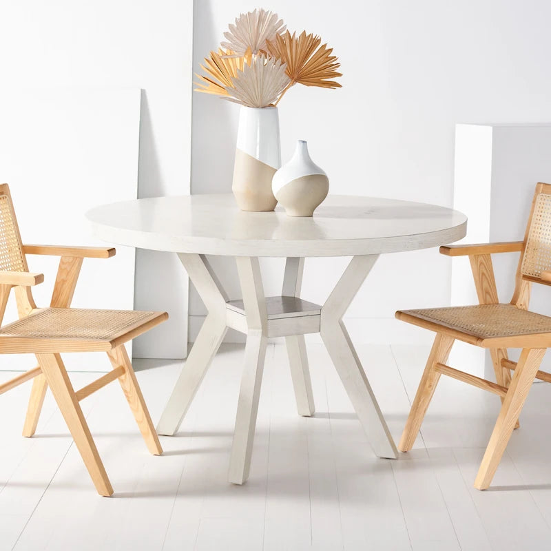 Table à manger ronde en bois charbon de bois base en V inclinée style bistrot français contemporain