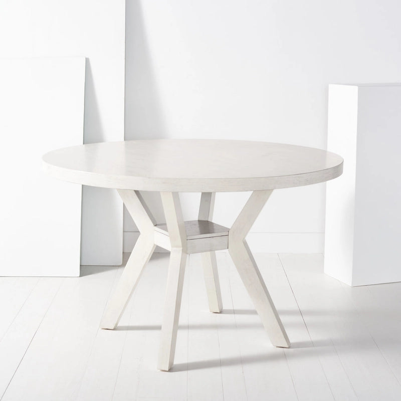 Table à manger ronde en bois charbon de bois base en V inclinée style bistrot français contemporain