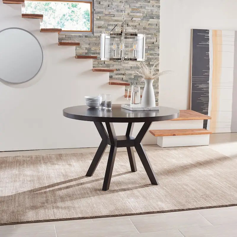 Table à manger ronde en bois charbon de bois base en V inclinée style bistrot français contemporain